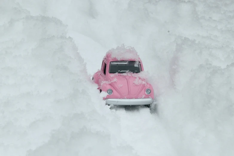 a pink toy car is buried in the snow, flickr, figuration libre, beetle, photograph credit: ap, detail, heavy snow storm