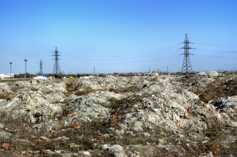 a pile of rubble with power lines in the background, minimalism, baotou china, an ecological gothic scene, modern high sharpness photo