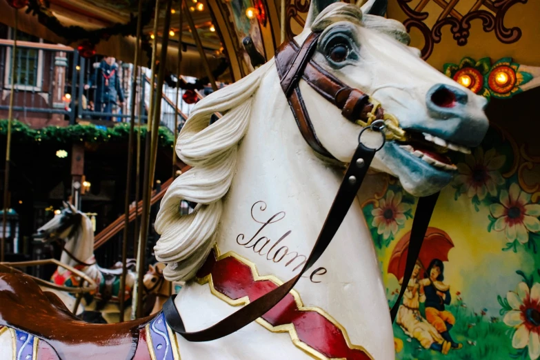 a close up of a horse on a carousel, by Alice Mason, shutterstock, baroque, 💋 💄 👠 👗, 1894, cosy, saying