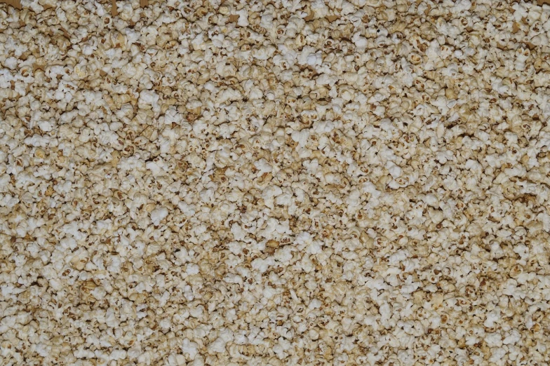 a pile of popcorn sitting on top of a table, a stipple, by Howardena Pindell, pexels, mingei, texture of sand, 64x64, high texture detail), big oatmeal