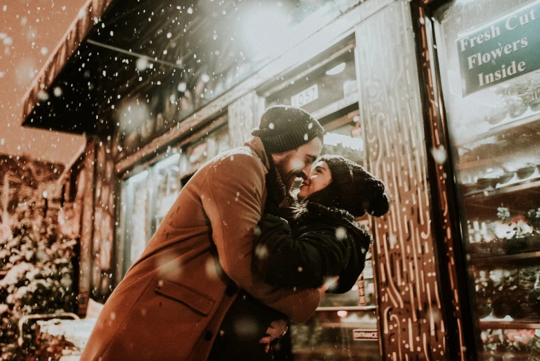 a man and a woman hugging in the snow, by Emma Andijewska, pexels contest winner, brandon woelfel, ✨🕌🌙, avatar image, cutest