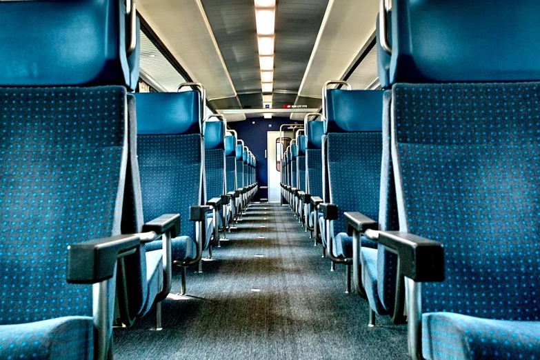 the inside of a train car with blue seats, flickr, platon, digitally enhanced, bullet train, tx