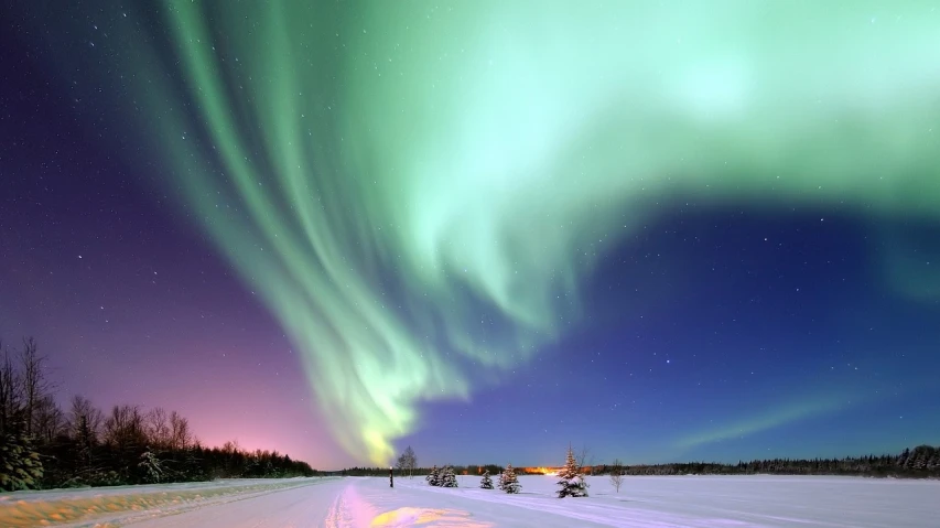 a group of people walking across a snow covered field, a picture, by David Michie, shutterstock, hurufiyya, northern lights in space, majestic!!! beautiful!!!, beatiful lights, crisp smooth lines