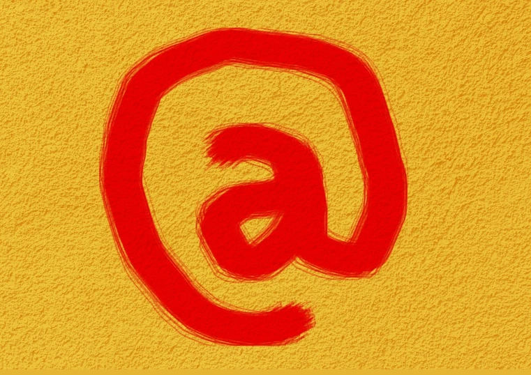 a red at sign painted on a yellow wall, a pastel, inspired by Antonín Chittussi, trending on pixabay, letterism, logo for a social network, postage, enso, very grainy