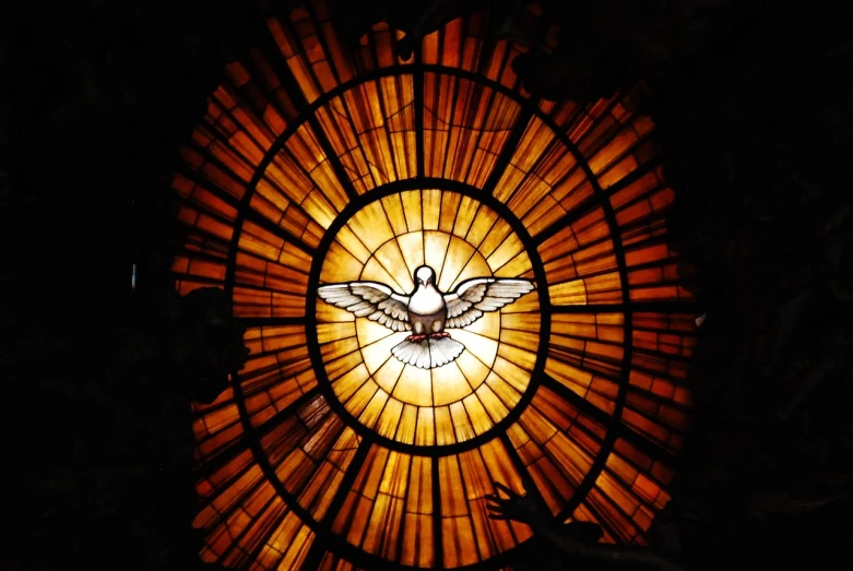 a stained glass window with a dove in it, by Cagnaccio di San Pietro, pixabay, symbolism, icon with a halo of fire, wallpaper!, inside a dome, spotlight shining through