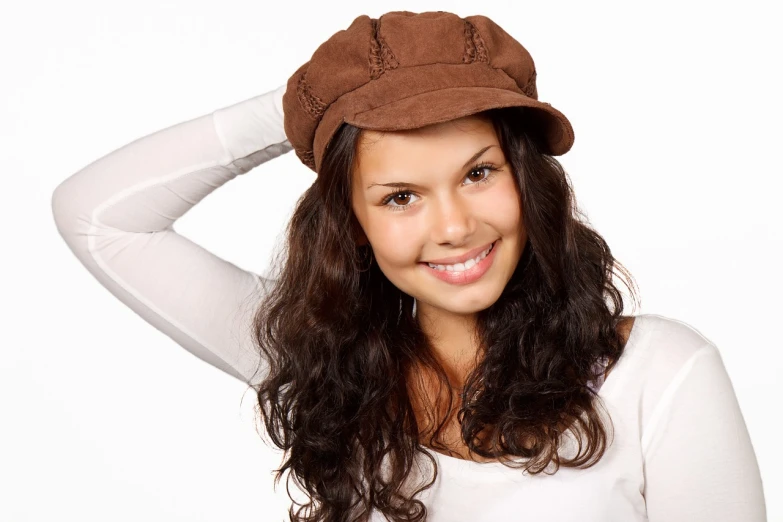 a beautiful young woman wearing a brown hat, shutterstock, hanna montana, dolman, cute:2, curly