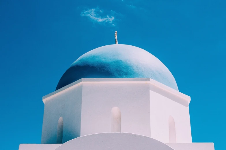 a blue dome on top of a white building, inspired by Theophanes the Greek, unsplash contest winner, shot on superia 400 filmstock, holy ceremony, incredibly beautiful, rich azure tones