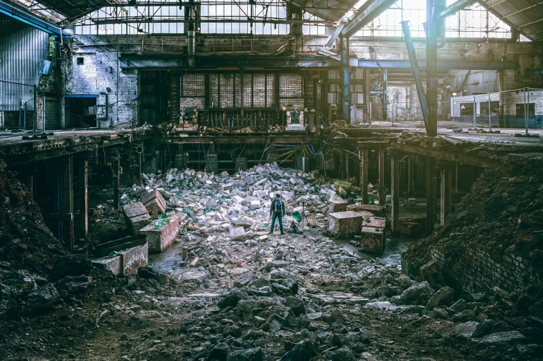 a couple of people that are standing in a building, inspired by Thomas Struth, unsplash contest winner, arte povera, mining scrap metal, debris on the floor, smelting pit'beeple, instagram photo