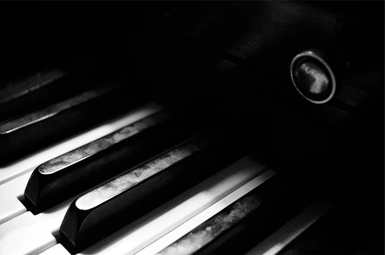 a close up of the keys of a piano, a black and white photo, by Eugeniusz Zak, desktop wallpaper, faded memories, hedi slimane, fanart