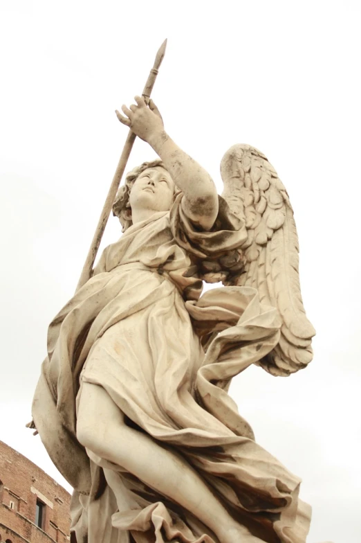 a statue of an angel holding a staff, inspired by Gian Lorenzo Bernini, baroque, shooting angle from below, high res photo