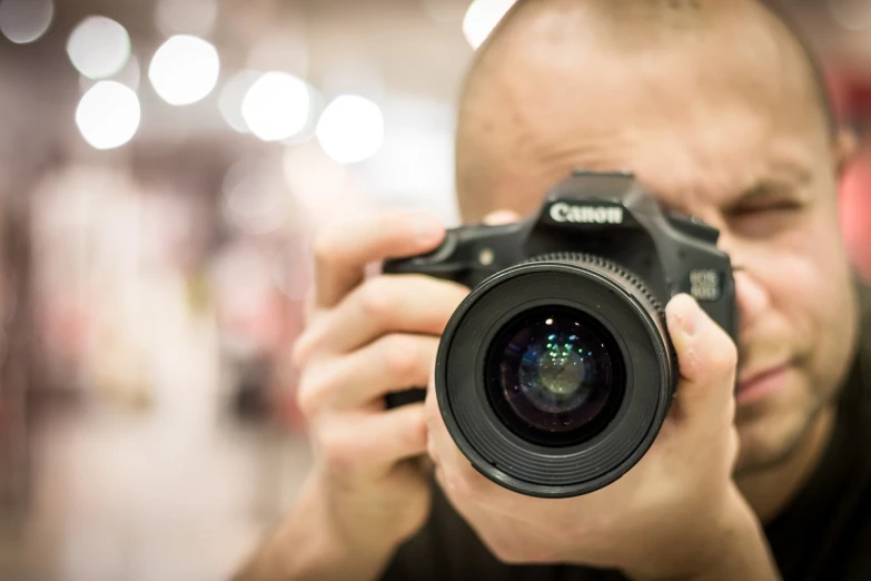 a man taking a picture with a camera, art photography, canon 5 d 5 0 mm lens, face in focus, medical photography, high-quality dslr photo”