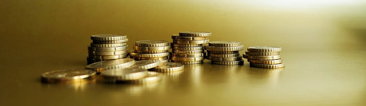 a pile of coins sitting on top of a table, by Matija Jama, pixabay, gold background, telephoto shot, ilustration, ad image