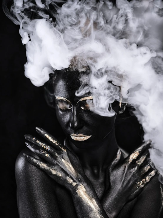 a black and white photo of a woman with smoke coming out of her face, inspired by Hedi Xandt, art photography, gold bodypaint, man is with black skin, 8k)), cloud goddess