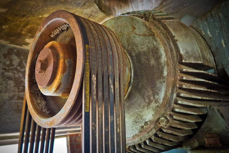 a close up of a pulley on a machine, a portrait, flickr, hdr!, ventilation shafts, photo of poor condition, actual photo