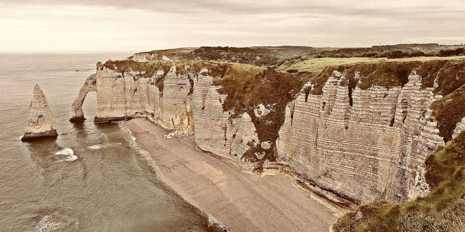 a group of people standing on top of a cliff next to the ocean, a matte painting, by Raphaël Collin, pexels, les nabis, omaha beach, between sedimentary deposits, vertical wallpaper