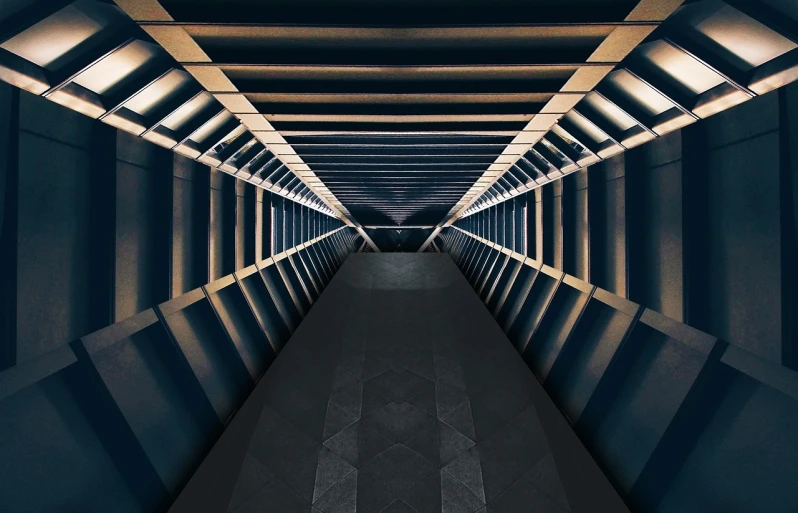 a long hallway with a light at the end of it, inspired by Beeple, unsplash contest winner, photo realistic symmetrical, metallic bridge, dark abstract background, geometric abstract