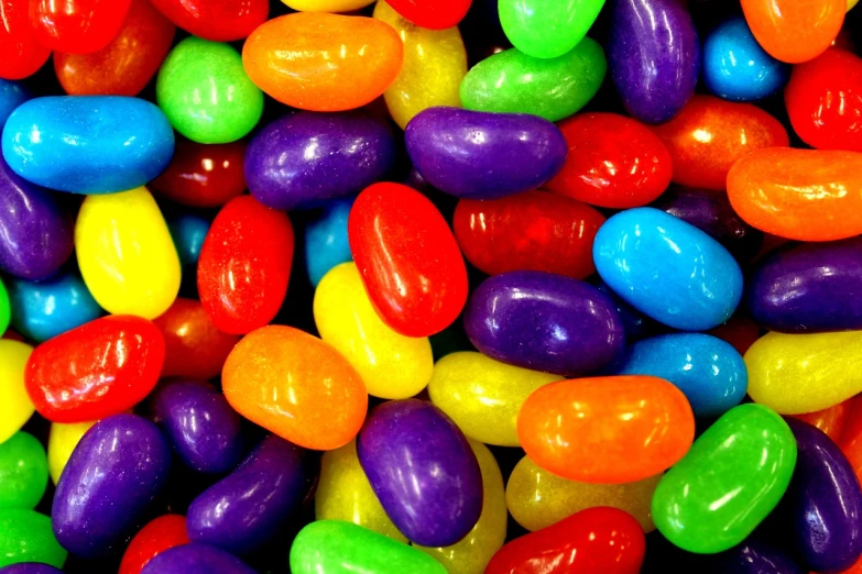 a close up of a pile of jelly beans, by Joe Bowler, rgb color, super bright colors, chocolate, award winning