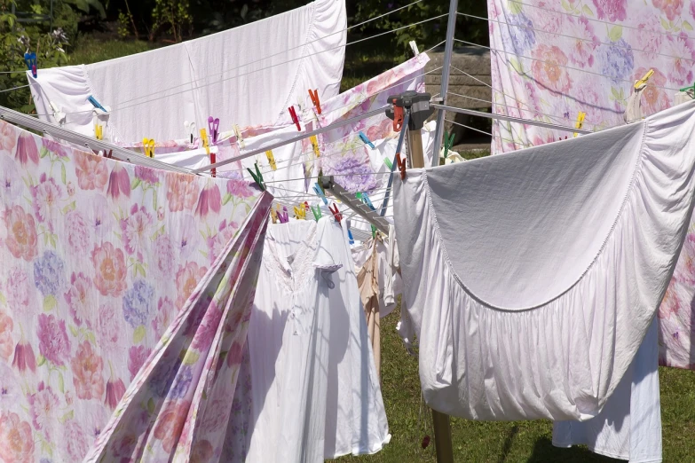 clothes hanging out to dry on a clothes line, inspired by Peter Alexander Hay, flickr, with screens and silks, floral clothes ”, white loincloth, pastel overflow