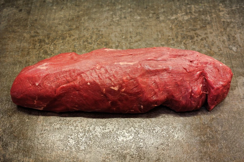 a piece of meat sitting on top of a table, by Jan Rustem, flickr, sōsaku hanga, red waist-long hair, slightly buck - toothed, lined up horizontally, side view profile centered