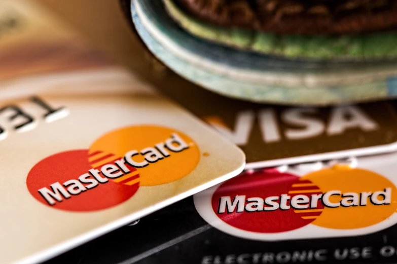 a pile of credit cards sitting on top of each other, a photo, by Adam Marczyński, renaissance, pair of keycards on table, stylized, listing image, masterstroke