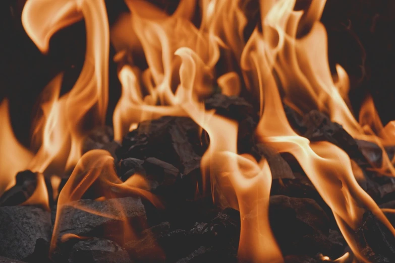 a close up of a fire with flames coming out of it, inspired by Rodney Joseph Burn, vertical wallpaper, coal, wallpaper - 1 0 2 4, avangard