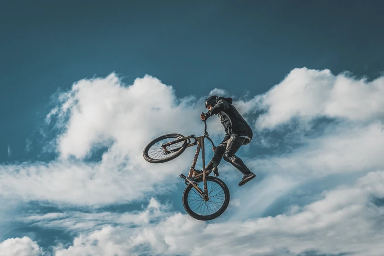 a man flying through the air while riding a bike, by Romain brook, pexels contest winner, surrealism, high clouds, crypto, mechanic, 🚿🗝📝