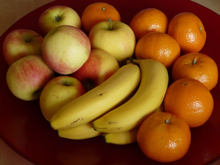 a bowl of apples, oranges, and bananas on a table, by Dietmar Damerau, pexels, full of colour 8-w 1024, bottom angle, grain”, unedited