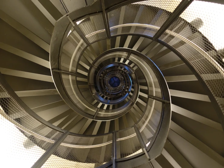 a spiral staircase leading to the top of a building, a picture, by Jon Coffelt, flickr, bauhaus, auckland sky tower, highly detailed and hypnotic, in a claustrophobic, panzer