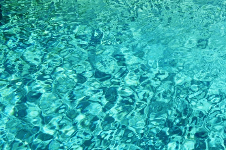 a pool filled with lots of clear blue water, a picture, by Harold von Schmidt, shutterstock, fine art, depth detail, dappled, full of greenish liquid, realistic reflections