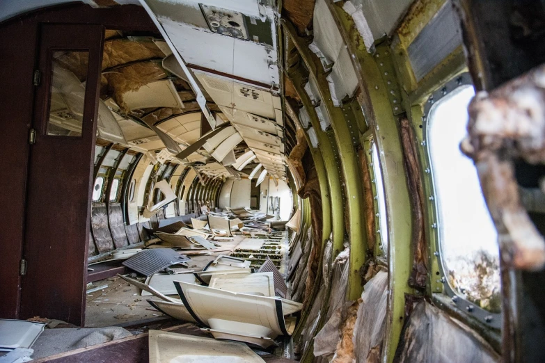 a view of the inside of an abandoned plane, a portrait, by Richard Carline, full shot photo, 4 0 9 6, demolition, panels