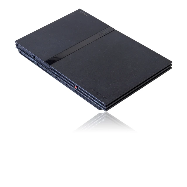 a laptop computer sitting on top of a white surface, playstation 2 graphics, 2263539546], packshot, playstation 2 gameplay still