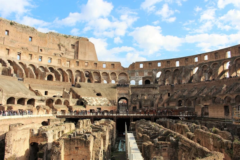 a view of the interior of the colossion in rome, pexels, destroyed human structures, 🕹️ 😎 🔫 🤖 🚬, jessica, b