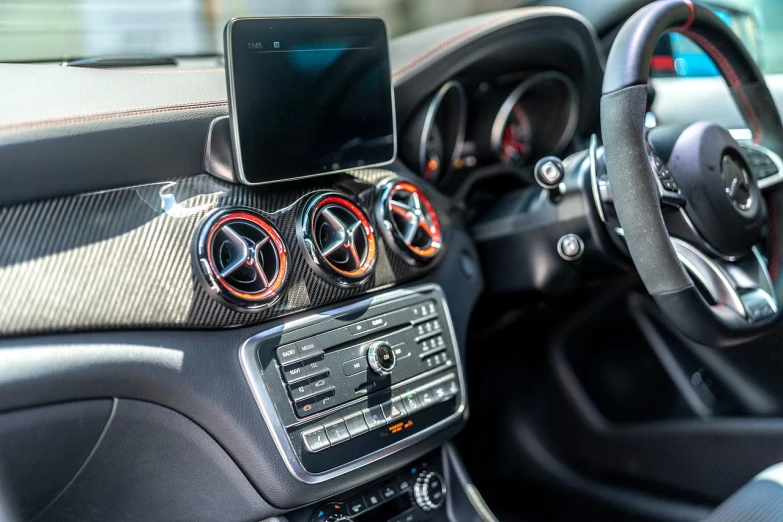 a cell phone mounted to the dashboard of a car, by Julian Allen, pexels, maximalism, mercedez benz, carbon fiber, silver red white details, wide angle shot 4 k hdr