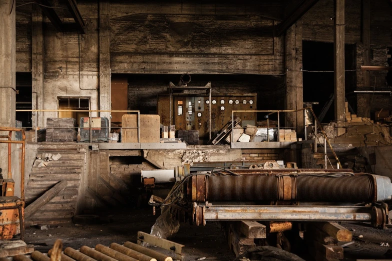 a room filled with lots of different types of wood, by Kurt Roesch, flickr, dark industrial atmosphere, volcanic workshop background, beige and dark atmosphere, stock photo