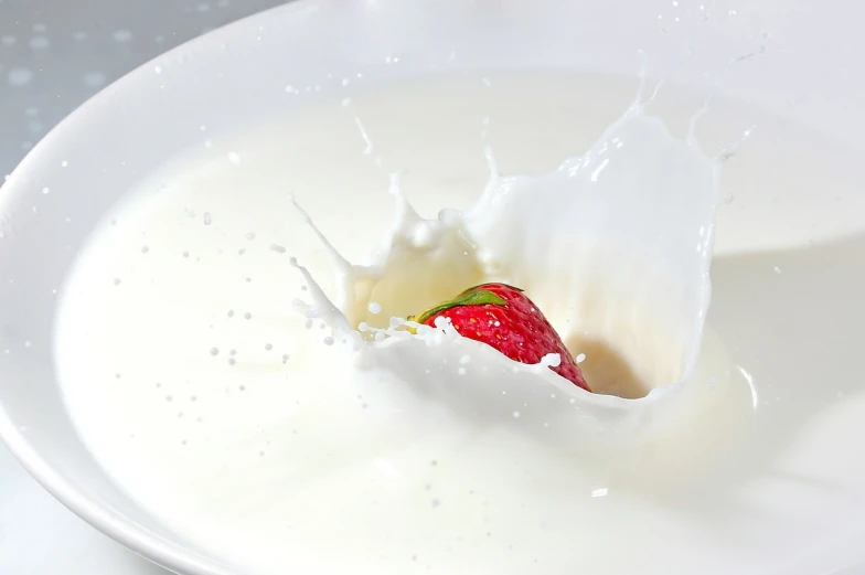 a strawberry falling into a bowl of milk, pixabay, organic ceramic white, ivory, gleaming white, seams