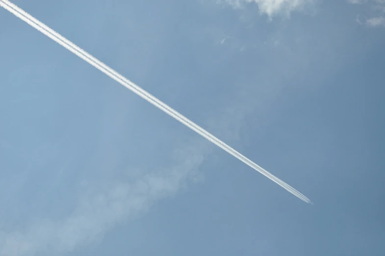 a plane that is flying in the sky, by Thomas de Keyser, very accurate photo, 8 0 mm photo, streaks, けもの
