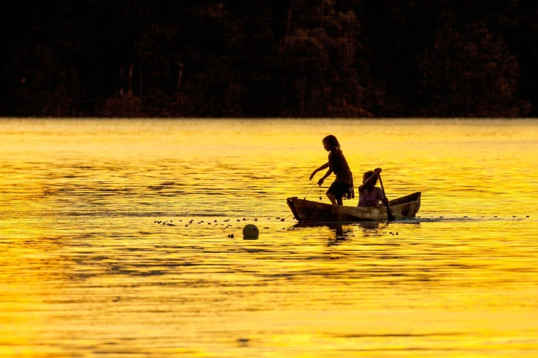 a couple of people in a small boat on a lake, by Istvan Banyai, flickr, precisionism, dappled golden sunset, paddle and ball, kids, brazil