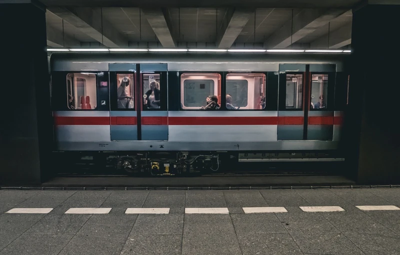 a train that is sitting in a station, a picture, unsplash contest winner, figuration libre, vienna, stock photo