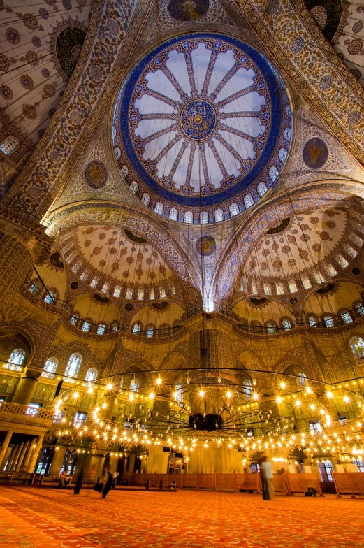 a picture of the inside of a building, a mosaic, by Jakob Gauermann, shutterstock, with beautiful mosques, blue lamps on the ceiling, ottoman sultan, celebrity