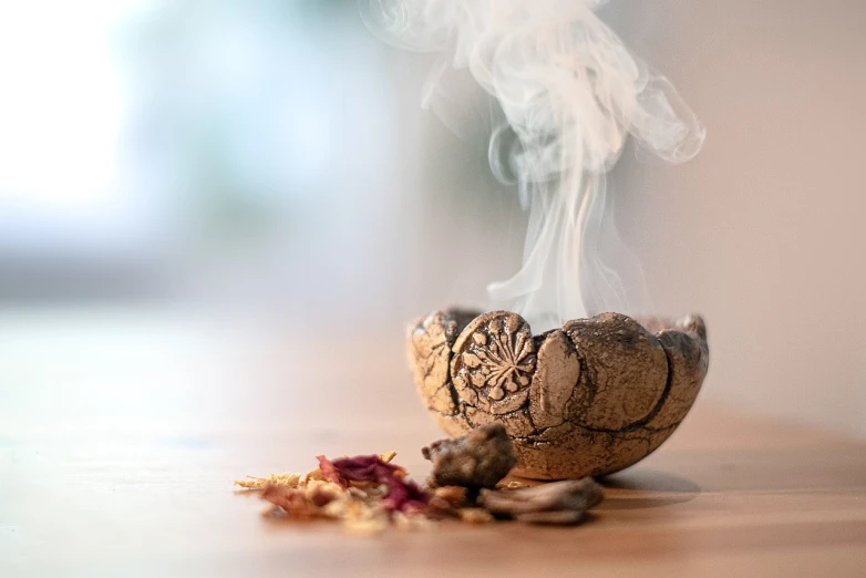 a wooden bowl with smoke coming out of it, renaissance, flower, close up shot of an amulet, at home, packshot