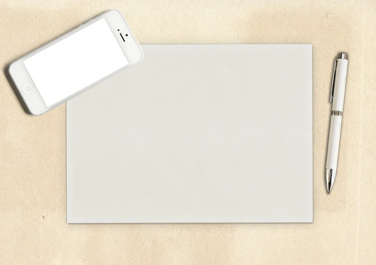 a cell phone sitting on top of a piece of paper next to a pen, a minimalist painting, inspired by Telemaco Signorini, shutterstock contest winner, minimalism, sand - colored walls, white color, rectangle, parchment paper