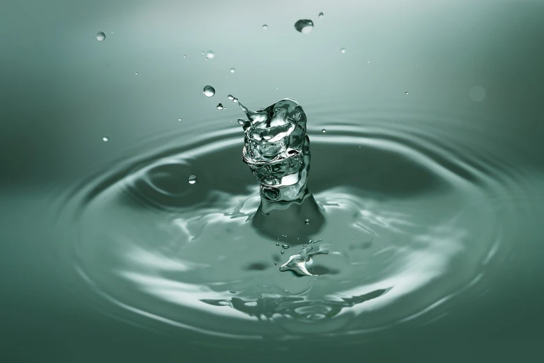 a water drop falls into a pool of water, by Edward Corbett, shutterstock, digital art, highly detailed 3 d render, detailed portrait shot, highly detailed product photo, raytraced render