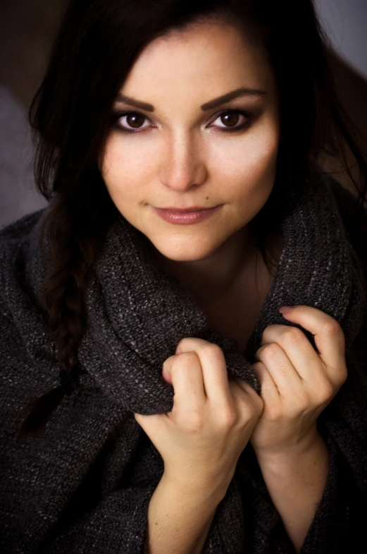 a close up of a person wearing a scarf, a portrait, gorgeous female jade tailor, wearing a dark sweater, actors, christina kritkou