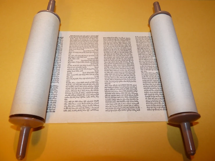 two torahs sitting next to each other on a table, by Scott M. Fischer, pixabay, unilalianism, parchment paper, 3/4 view from below, ebay photo, many columns