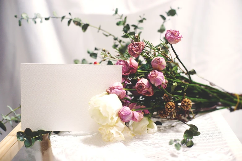 a bunch of flowers sitting on top of a table, a picture, by Rhea Carmi, pexels, romanticism, invitation card, on white paper, rose-brambles, detailed picture