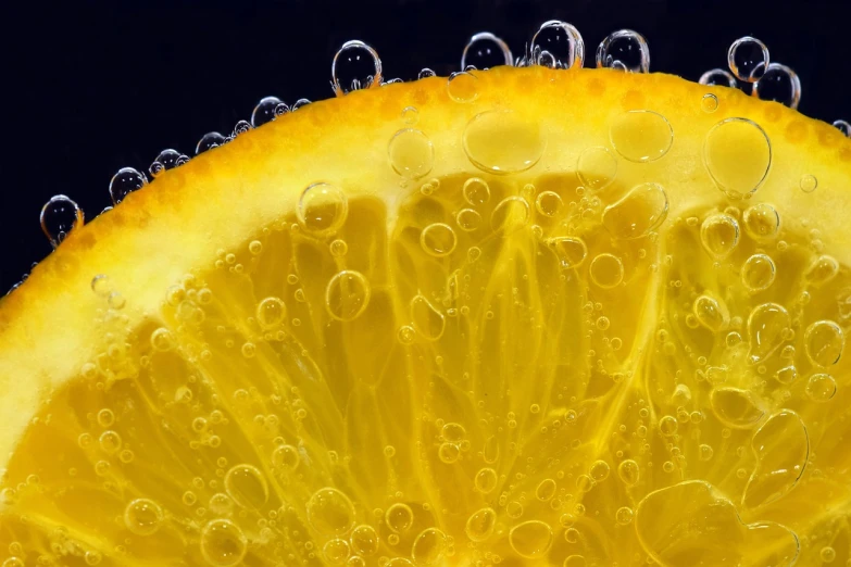 a close up of a slice of lemon with bubbles, a macro photograph, by Hans Schwarz, pixabay, digital art, realistic depth, oranges, wallpaper - 1 0 2 4, lemonade