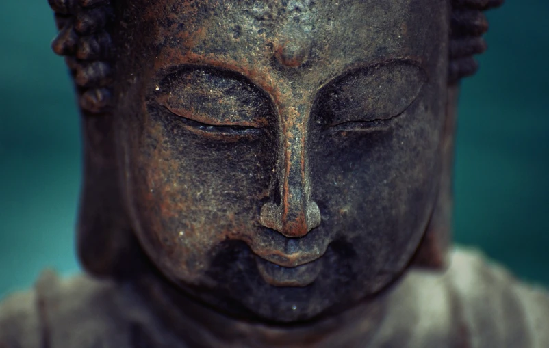 a close up of a statue of a person's face, pexels, minimalism, hindu stages of meditation, very slightly smiling, zen ink, high detail of the face