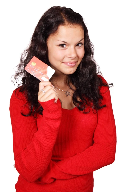 a woman in a red sweater holding a credit card, a photo, portlet photo