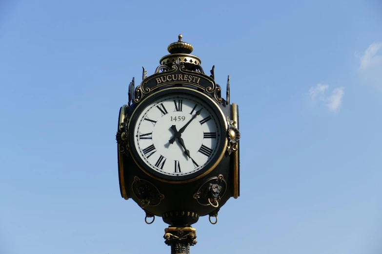 a close up of a clock on a pole, a photo, blue sky, rococo mechanical, watch photo