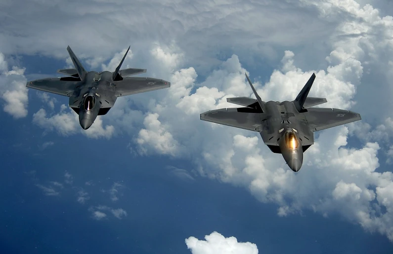 two fighter jets flying through a cloudy blue sky, f-22, wallpaper for monitor, falcon bms, aviators